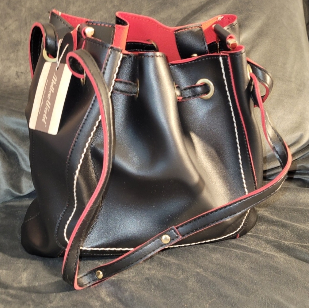 Mellow World Black Bucket Purse Red Fabric Lining Snap Closure Dooney Lookalike